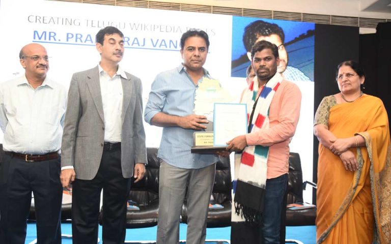 Minister KT Rama Rao presents the State Formation Day awards.