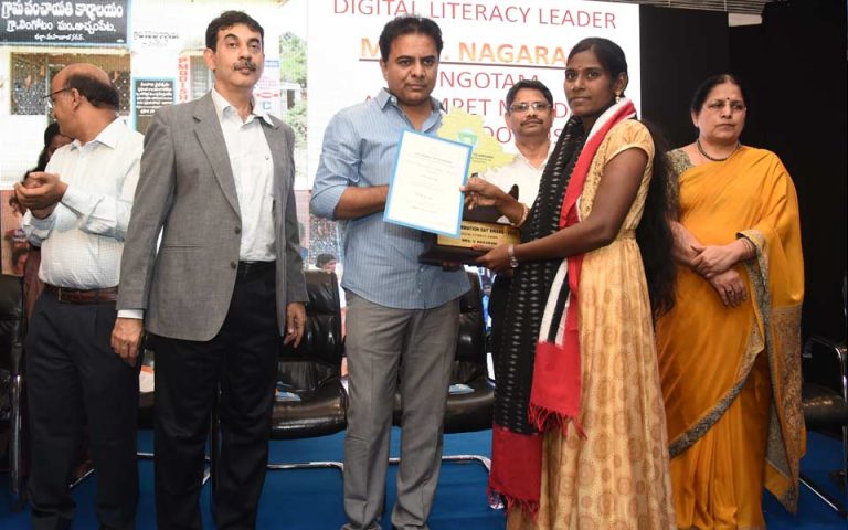 Minister KT Rama Rao presents the State Formation Day awards.
